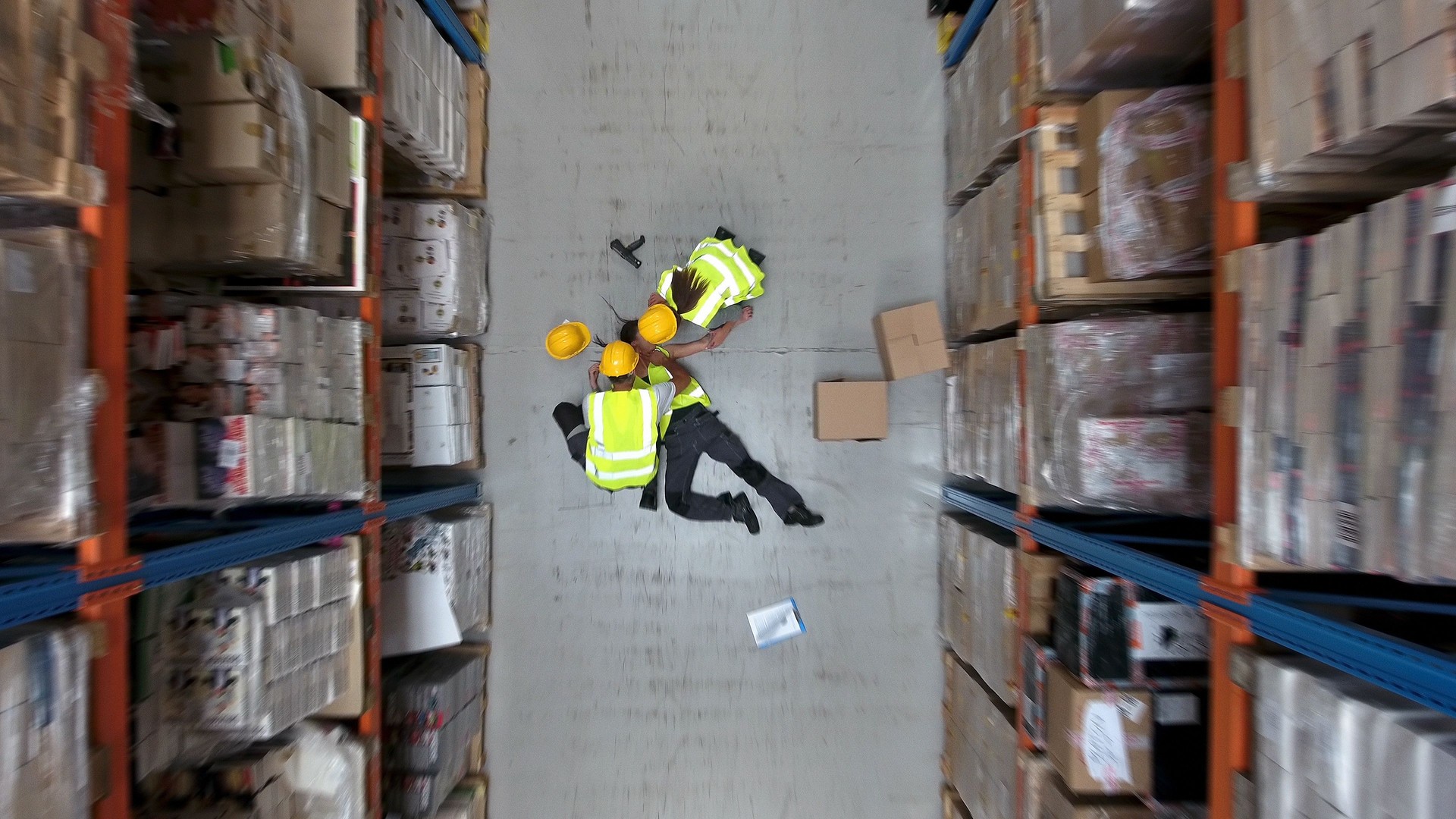 Dangerous accident during work. Warehouse aerial view